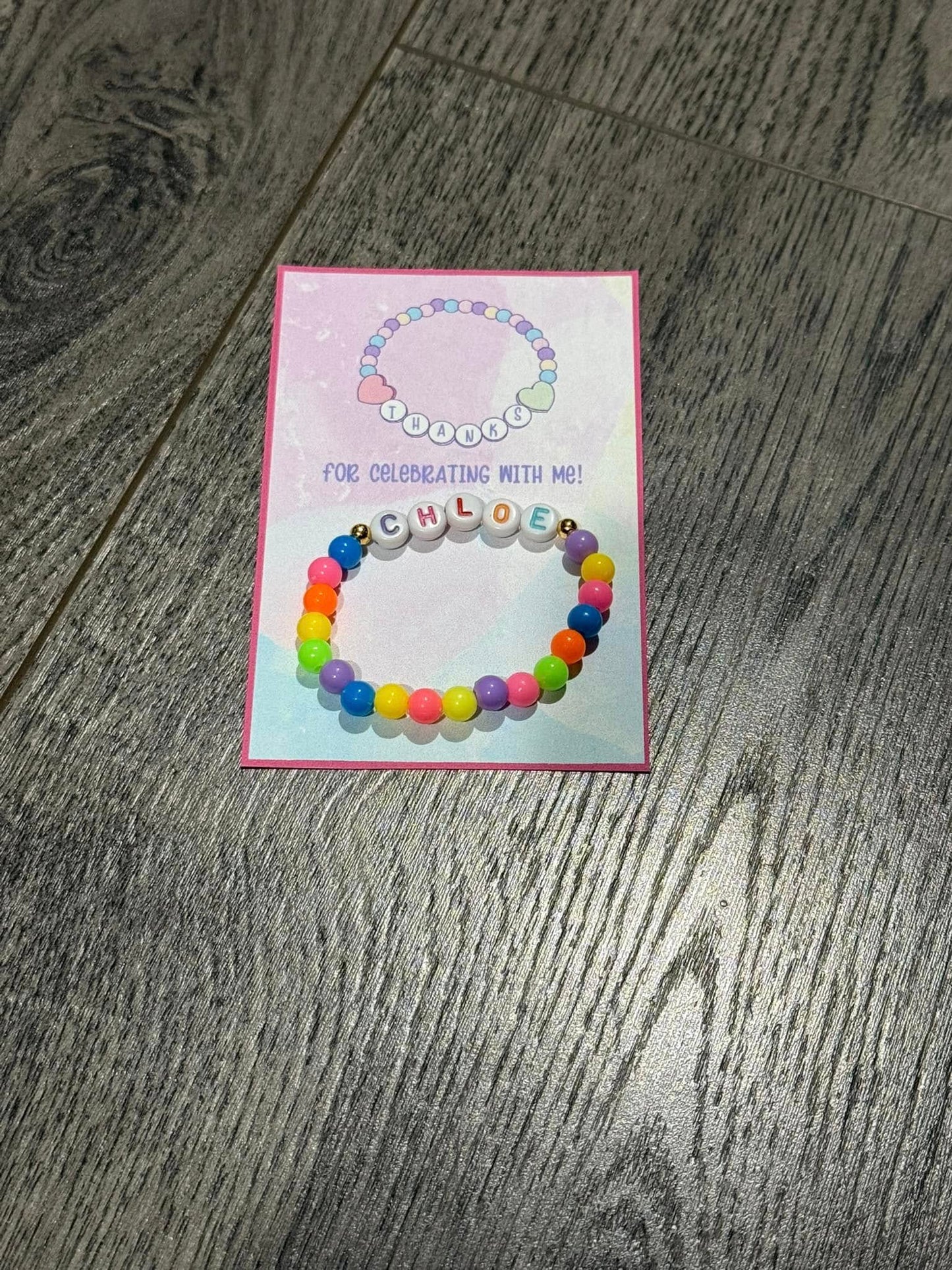 Beaded bracelet party favor with alphabet beads for girls’ parties
