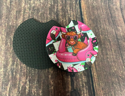 Highland cow on a floatie coaster for drinks